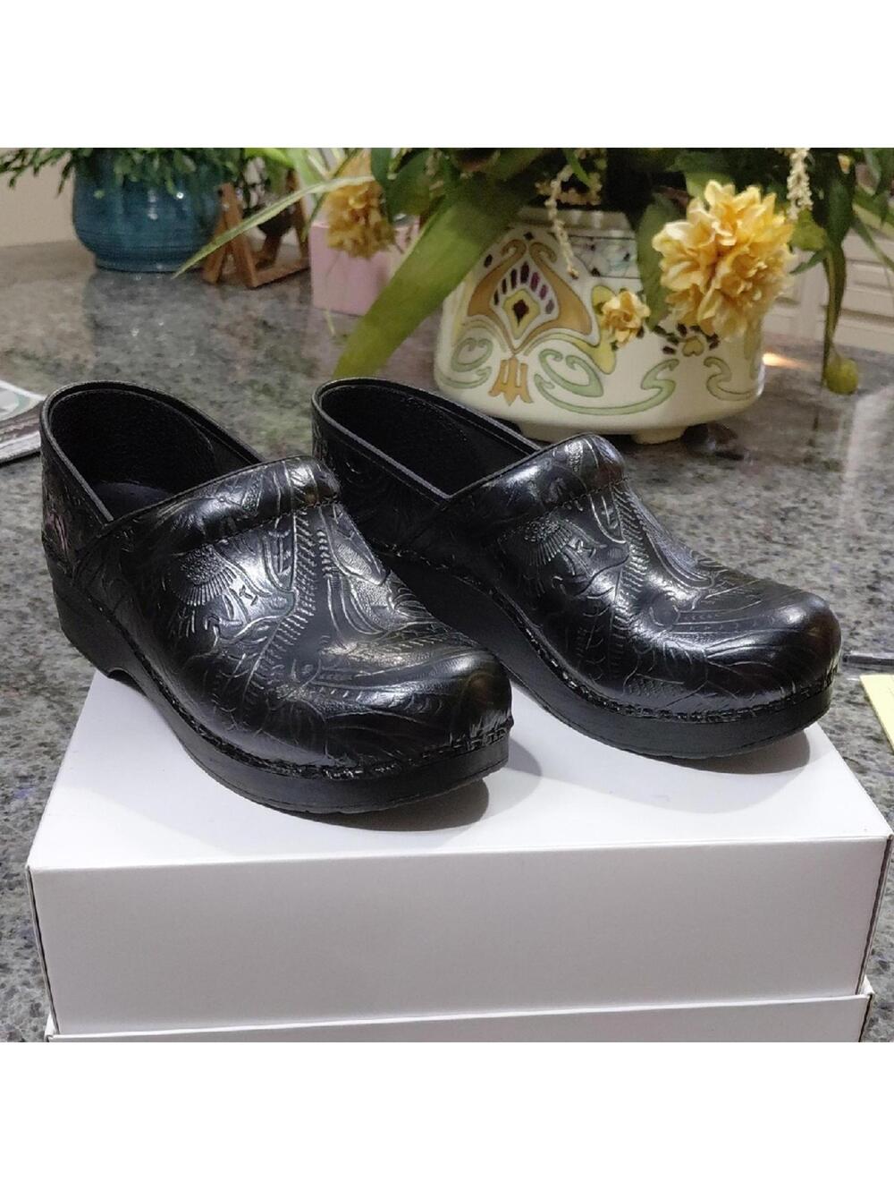 "Dansko" Sz.8-8.5, Black Embossed Women's Clogs. Leaf Design. Like new condition